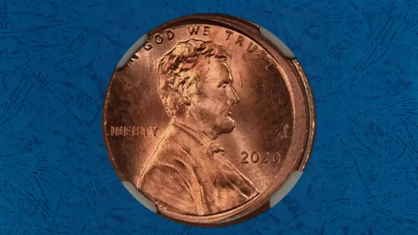 2020 penny off-center strike showing blank planchet area with partial Lincoln design and date visible